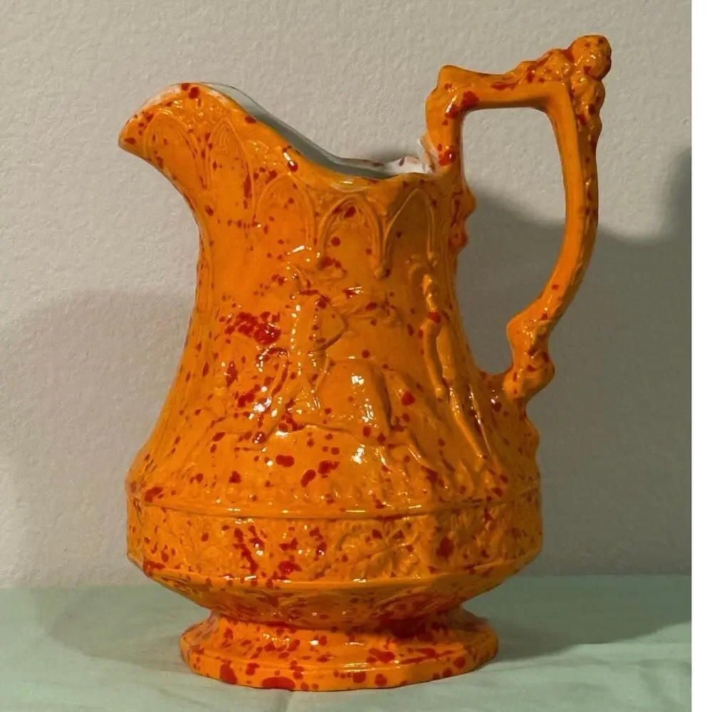 Vintage Medieval design ceramic mold pitcher. Knights jousting. 1979.